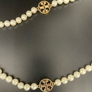Tory Burch Pearl and Gold Logo Necklace.